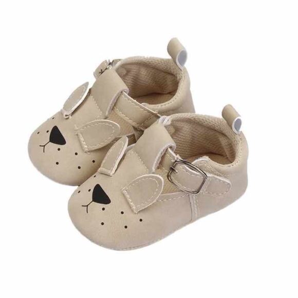 baby pram shoes in light cry colour with bunny face. t-bars with velcro closure.