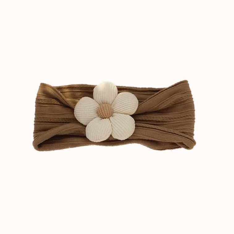 girls headband in brown with ecru flower detail at the front