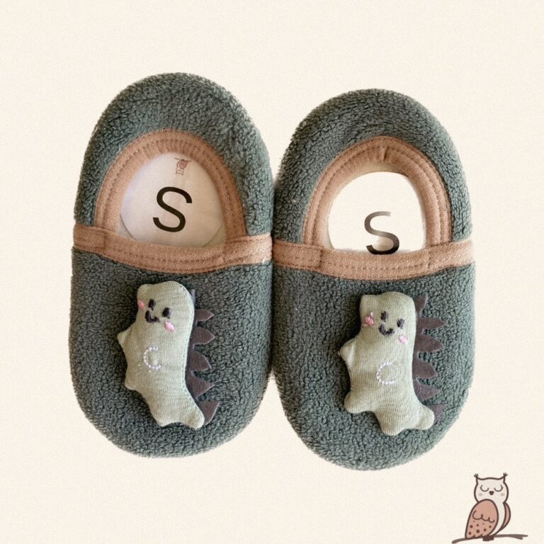 baby and toddler slippers in green with dinosaur on it