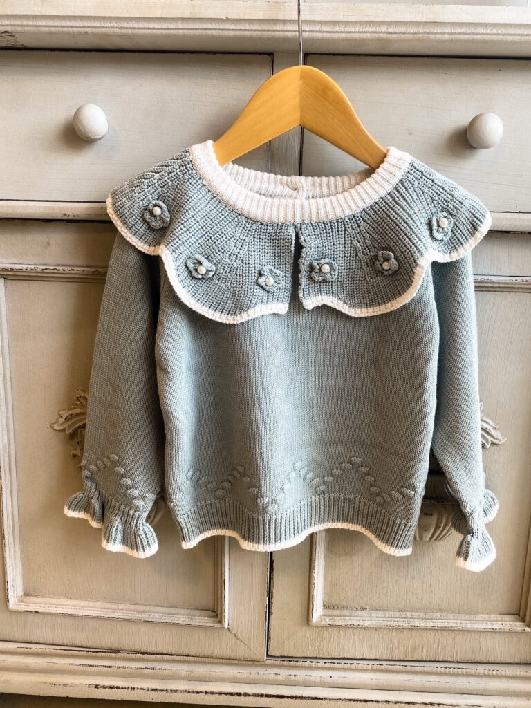 vintage blue knitted girls jumper with frilly collar